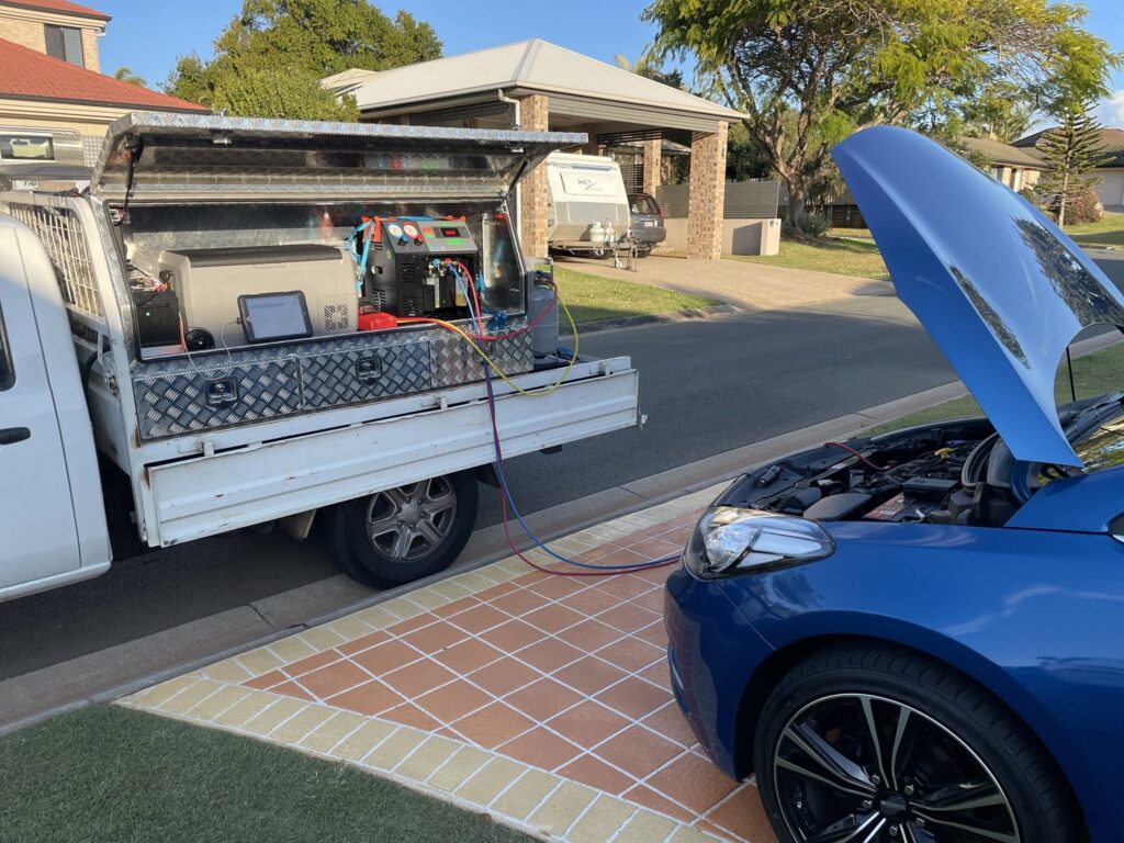 Mobile auto electrician van servicing a car in Auckland - mobile auto electrician auckland